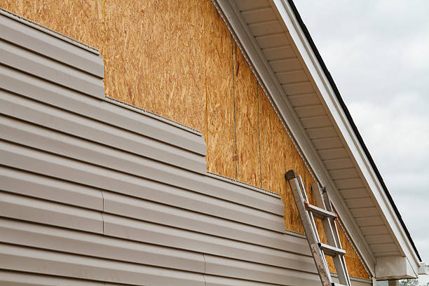 Professional Vinyl Siding technician working in Portland, IN